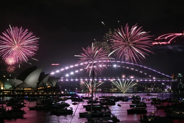 New Year 2026 celebrations with fireworks over a city skyline