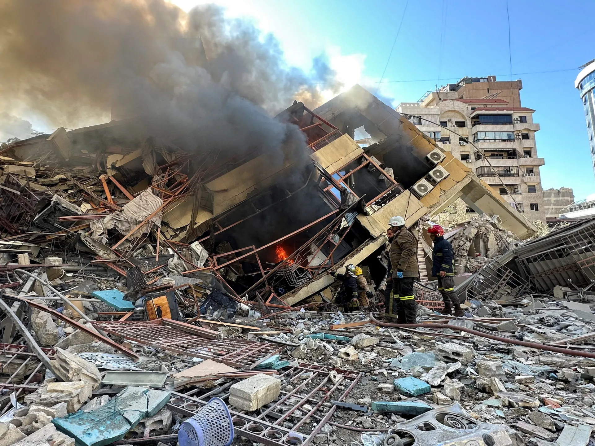 Iran war latest updates showing smoke rising near Dubai airport and Gulf oil facilities